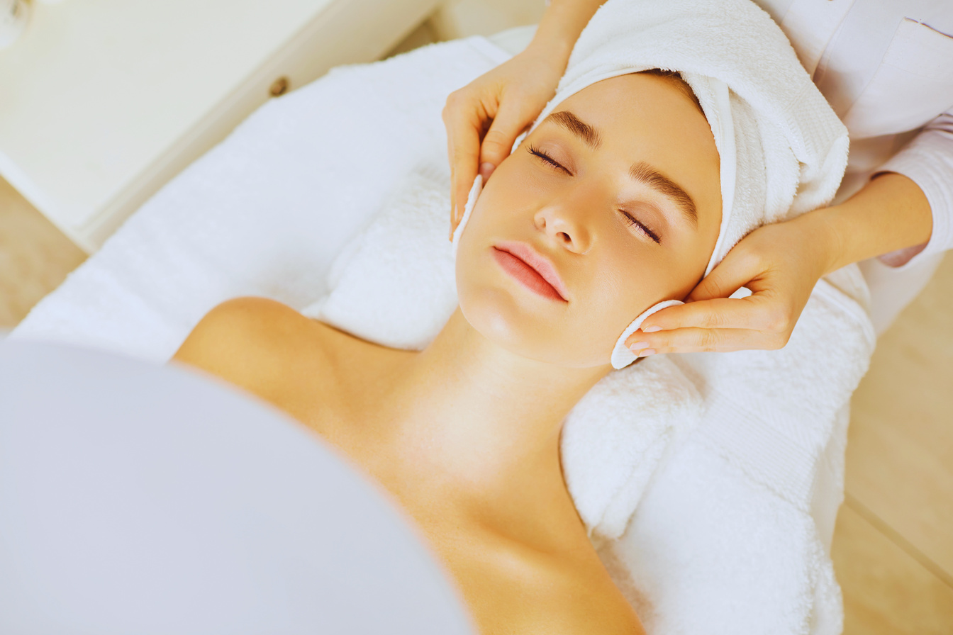 Beautician Makes Cleansing Facial Skin Girl.